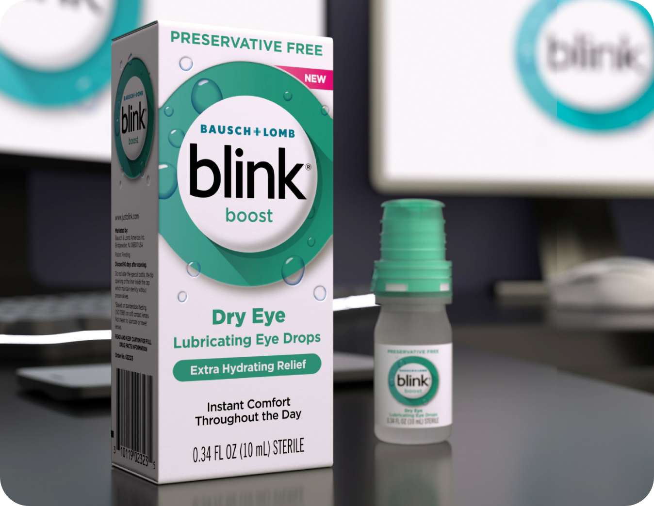 Single-use vial of Blink Tears Preservative Free lies on a counter next to its carton